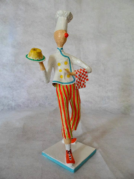 Papel-pra-toda-Obra-chef Papel-pra-toda-Obra-chef carrying a cake