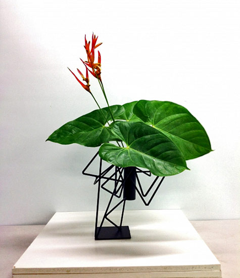 Pats-Ikebana--2013 Pats-Ikebana--2013 red flowers and large green leaves