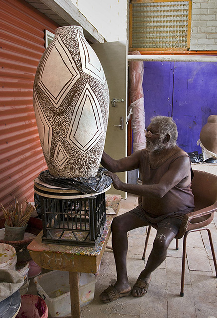 Pepai Carroll-creating-pottery-437x639 Pepai Carroll with work in progress for the ICAA, image courtesy Ernabella arts. -