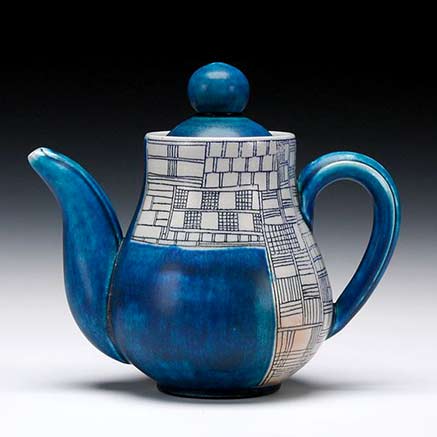Porcelain---Much-More-than-White-November-20,-2013-through-December-09,-2013-Work-shown-is-by-Julia-Galloway julia-Galoway ceramic teapot - blue glaze with geometric detailed panels