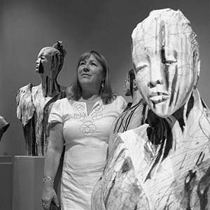 portrait-ann-goodfellow ann-goodfellow posing with her sculptures