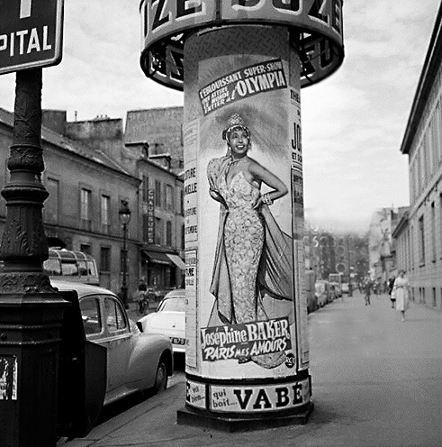 Josephine-Baker-billboard-paris Poster-on-a-billboard,-for-Josephine-Baker's-review---'Paris-mes-amours',-to-the-Olympia.-Paris,-street-of-Sevres,-1959.-RV-167768