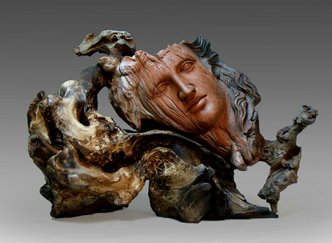 yiannis-nanouris-sculpture-475x348 Face Raku sculpture on Naxian emery rock formations