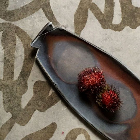 Catherine-White-ceramic-platter Rambutan-on-woodfired-plate - Catherine White