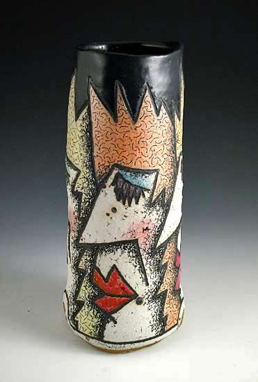 Rimas-Vis-Girda-ceramic-vase Rimas VisGirda-Tall Black cylinder vase with abstract head motifs