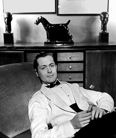 Robert-Montgomery-by-George-Hurrell,-1934 Robert-Montgomery-with Art Deco scotty dog