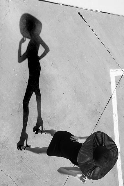 shadow-silhouette-lady lady wearing hat shadow-mid-century