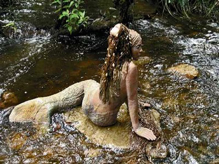 Bruno's-art-and-sculpture-garden Mermaid sculpture in a mountain stream