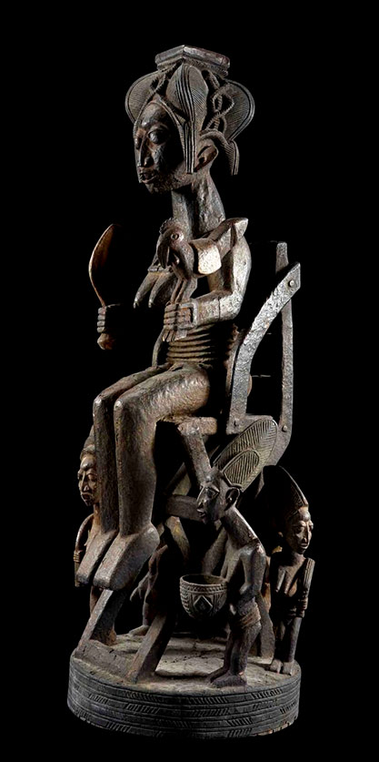 Statue-'Priestess-with-her-entourage'-from-the-workshop-of-Olowe-von-Ise-from-the-Yoruba-people-of-Nigeria--Altar-figure
