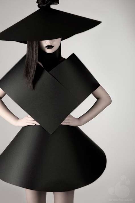 olga-zavershinskaya-fashion-designer suprematism-ii-by-olga-zavershinskaya - model wearing a black geometrical dress and hat