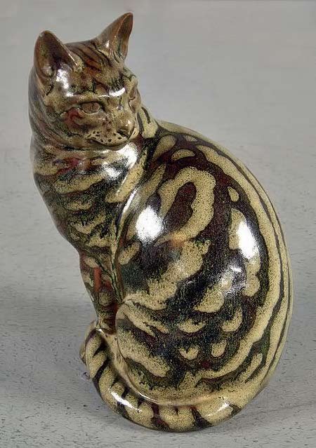 Tabby-cat-sculpture-by-Charles-Vyse Tabby-cat--ceramic-decorated-with-figured-tenmoku-glaze-to-represent-fur---Charles-Vyse-cat