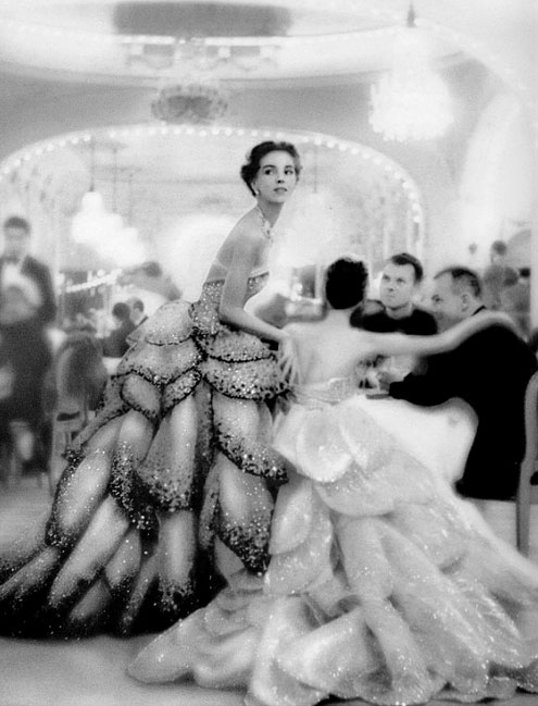 Richard-Avedon-photo-Le-Pré-Catalan Theo-Graham-in-Dior-s-evening-gown-called--Junon---l--and-Dorian-Leigh-in-gown-called--Venus---photo-by-Richard-Avedon-at-Le-Pré-Catalan--Paris-August-1949