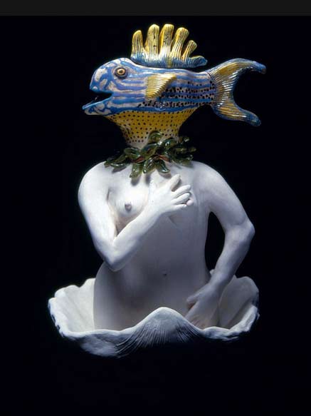 Thirst-of-Venus-Carol-Gentithes Carol-Gentithes-sculpture of a fish headed torso in a large sgell