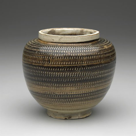 473px-472px-sgrafitto-jar.jpg this jar is ornamented in the scraffito manner with an olive-brown overslip carved through to a white slip