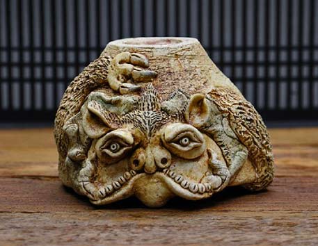 Tonomo-Misao-carved-ceramic-cup Tonomo Misao carved ceramic cup with animal reliefs