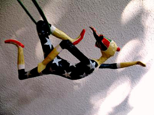 Trapeze-artist in the lira papietá Trapeze artist-papier mache