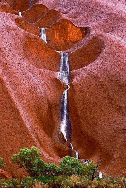Uluru-Waterfalls,-Australia Red rock Uluru-Waterfalls,