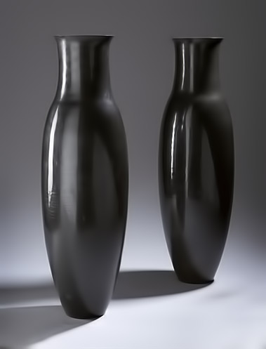jean-dunand-french-deco-vases-379x479 pair of black lacquer vases by Jean Dunand
