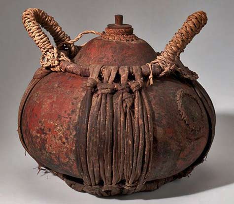 Vessel-with-stopper-from-the-Runtu-Camp,-Okavango-Delta,-Southwest-Africa Vessel-with-stopper-from-the-Runtu-Camp,-Okavango-Delta