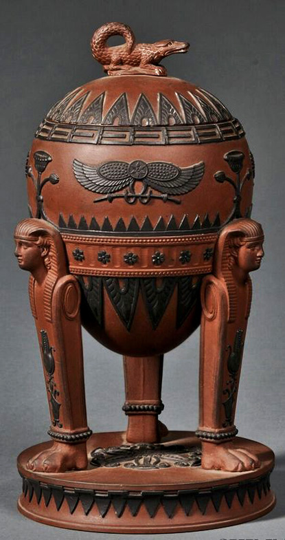 Rosso-Antico-Egyptian-Vase-and-Cover Wedgewood Early 19th century, chocolate-brown ground with crocodile finial lidded vase