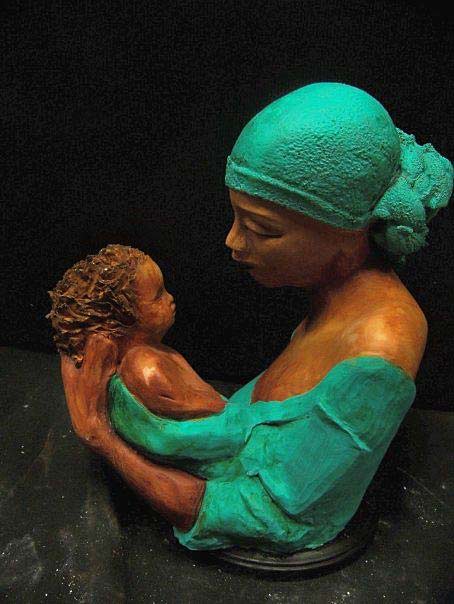 Woodrow-Nash-ceramic-sculpture Woodruff Nash mother holding child bust - Women with green headscarf holding a baby