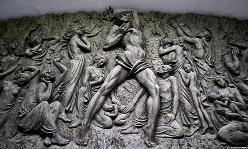 Writhing-figures-in-a-relief-at-the-exit-to-Buyuk-Ipak-Yuli-(Great-Silk-Road)-stationphotographer, Amos Chapple relief at the exit to Buyuk Ipak Yuli-(Great Silk Road)-station -- photographer, Amos Chapple