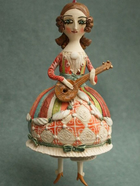 Yalonetski-Young-girl-playing-mandolin Young-girl-playing-mandolin.-Ceramic-bell,-sculpture.